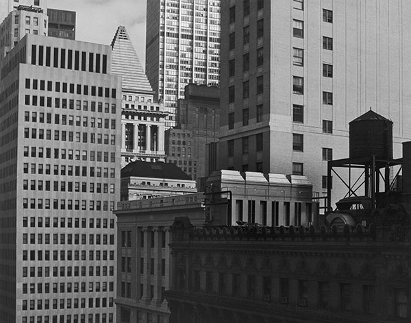 View from 25 Broadway, 1981. Background: Chase Manhattan Bank, 1960. Architect: Skidmore, Owings & Merrill.