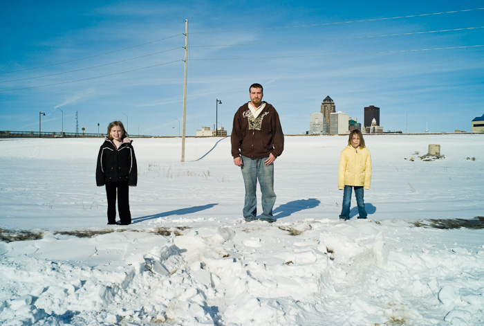  Joshua Chiles, of Des Moines, Iowa, with his daughters.   (© Lewis Kostiner)