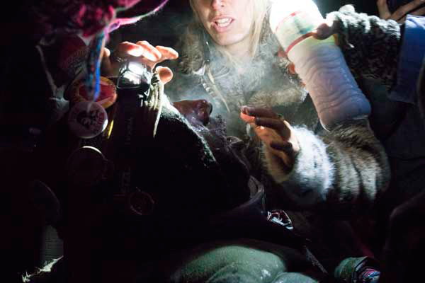 A medic treats a tear-gas victim during the conflict at Backwater Bridge.